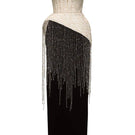 Elegant NIDALII gown by JOSÉPHINE, featuring flowing fabric and intricate design, showcased on a mannequin.
