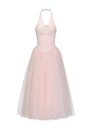 Elegant YMIR gown by JOSÉPHINE featuring flowing fabric and intricate detailing, perfect for formal occasions.