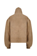 Lorena Saravia Julia suede jacket shown from the back, featuring a stylish design and soft suede material in a natural setting.