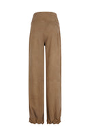 Back view of Lorena Saravia Julia suede pants showing their fitted style and smooth suede fabric.