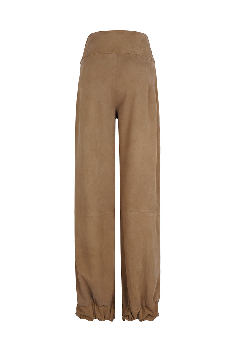Back view of Lorena Saravia Julia suede pants showing their fitted style and smooth suede fabric.