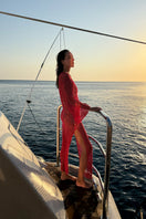 Jessica K June Red Dress cover-up, lightweight and stylish, featuring a vibrant red fabric perfect for beach or poolside wear.