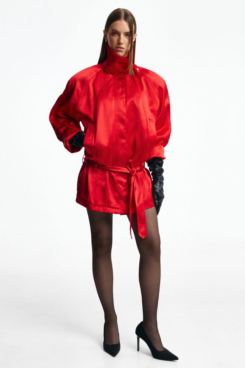 Red Santa Brands funnel neck jacket with a sleek design, featuring a high collar and stylish fit.