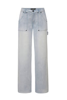 Blue Jade jeans by TT Studios displayed on a model, featuring classic denim style and fitted cut.