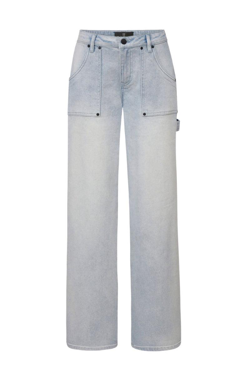 Blue Jade jeans by TT Studios displayed on a model, featuring classic denim style and fitted cut.
