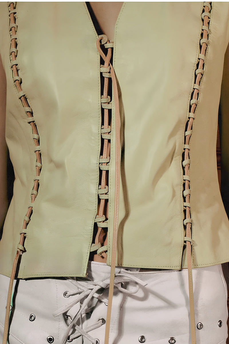 Double A jade leather vest in butter yellow, featuring a sleek sleeveless design with a smooth leather finish.