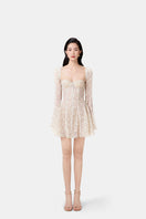Beige Jaliyah mini dress by Montsand, featuring intricate jaliya pattern, sleeveless design, and fitted silhouette.