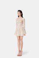 Beige Jaliyah mini dress by Montsand, featuring stylish jali cutout design and fitted silhouette, perfect for casual or semi-formal wear.