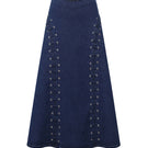 Light brown midi skirt from TT Studios' JAN SKIRT collection, featuring a flowing fabric and stylish design.