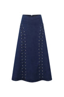 Light brown midi skirt from TT Studios' JAN SKIRT collection, featuring a flowing fabric and stylish design.