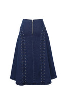 Light blue TT Studios Jan midi skirt with a flowy design, shown hanging on a wooden hanger against a neutral background.
