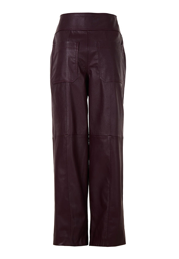 Japanese leather pants in wine red by MAZ Manuela Álvarez, showing sleek, fitted design with smooth leather texture.