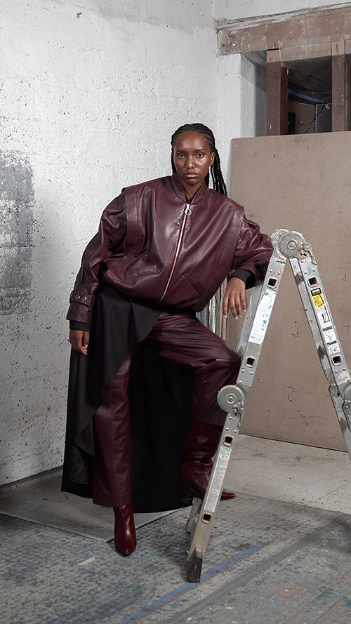 Japanese leather pants in wine red by MAZ Manuela Álvarez, featuring sleek design and soft leather material.