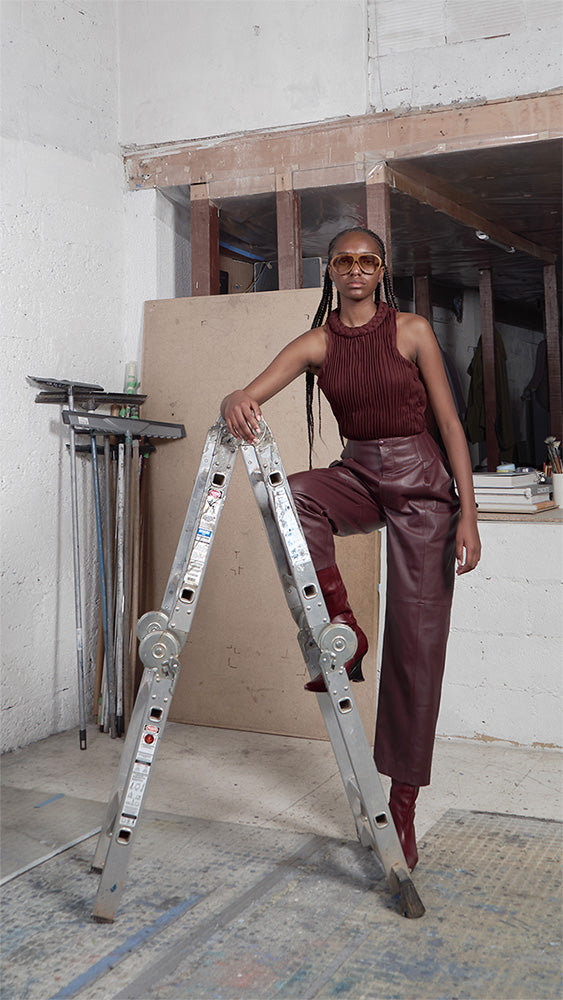 Japanese leather pants in wine red by MAZ Manuela Álvarez, featuring a sleek fit and smooth leather texture.