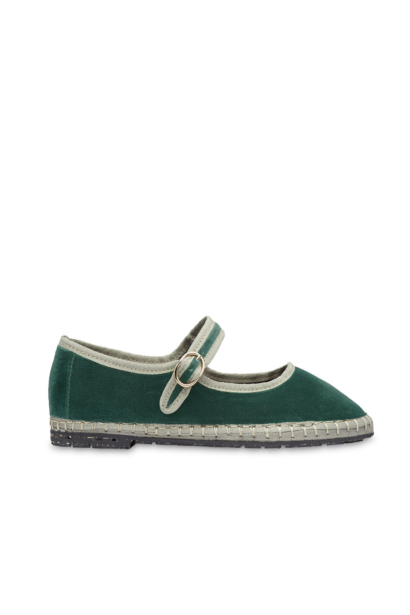Flabelus Jay green flats with light green piping, featuring a sleek design and comfortable slip-on style.