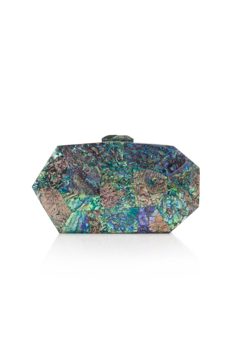 Green Jaya Paua Clutch by Freya Rose with cut-out design, showcasing elegant craftsmanship and vibrant paua shell details.