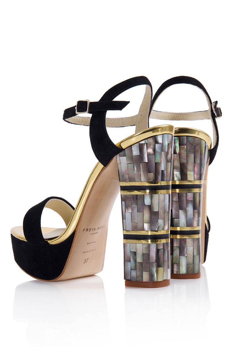 Pair of Freya Rose JITO suede heels featuring elegant pointed toes and sleek stiletto heels on a neutral background.