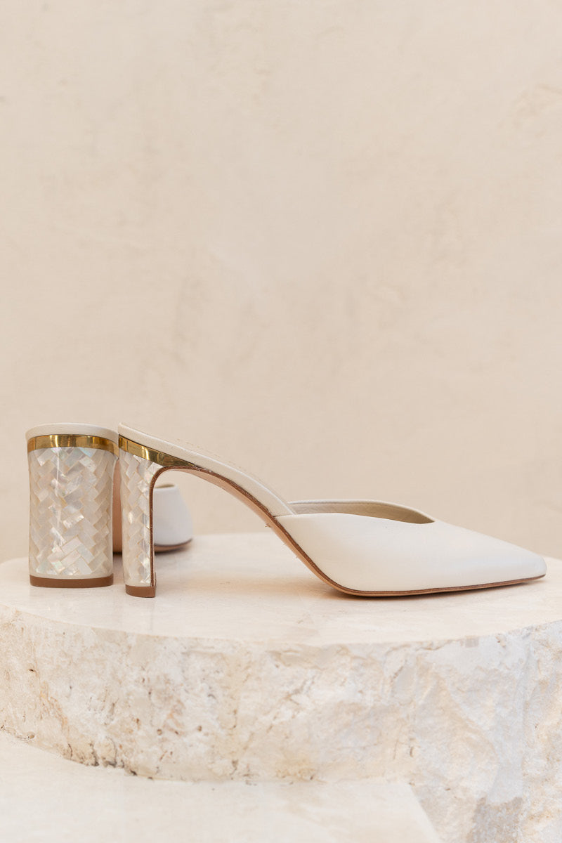 Ivory leather block heel shoes with pearl embellishments by Freya Rose, showcasing elegant design and stylish craftsmanship.
