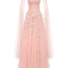 Elegant Rachel gown by Joséphine featuring flowing fabric and intricate detailing, perfect for formal occasions.