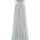 Elegant Joséphine Martha dress gown with flowing fabric and intricate details, perfect for formal occasions.