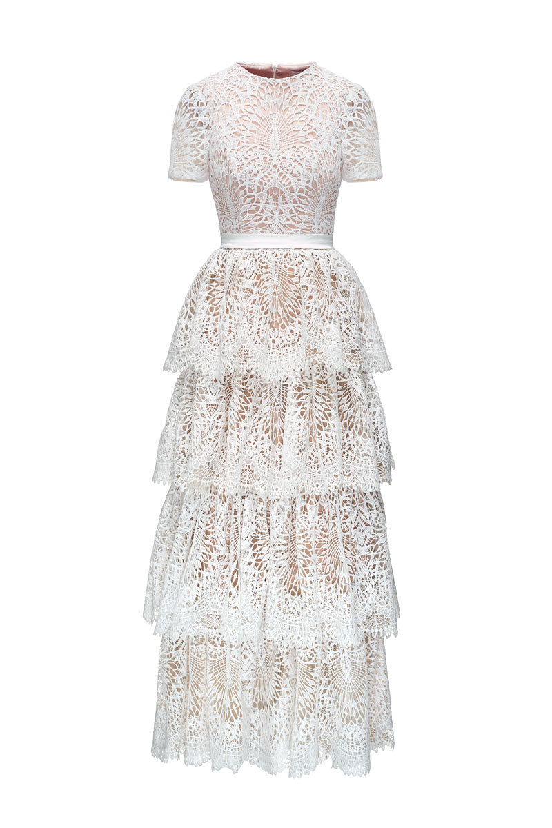 White Rella gown by JOSÉPHINE featuring elegant flowing fabric and a sophisticated design, perfect for formal occasions.