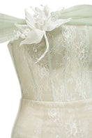 Green TINLEY dress gown by JOSÉPHINE, featuring elegant fabric and stylish design, shown on a model.