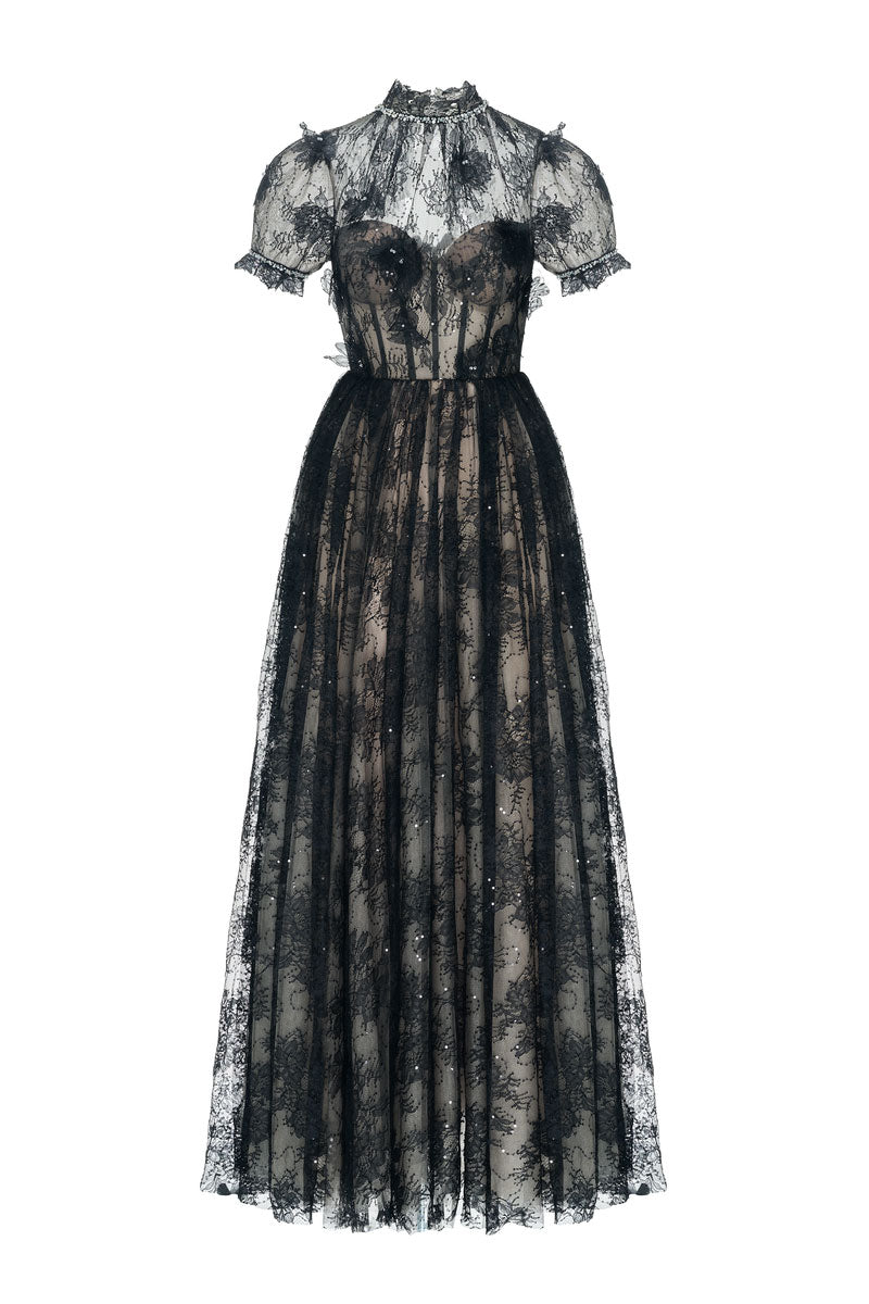 Black YEDDA gown by JOSÉPHINE, elegant floor-length dress with flowing fabric and sophisticated design.