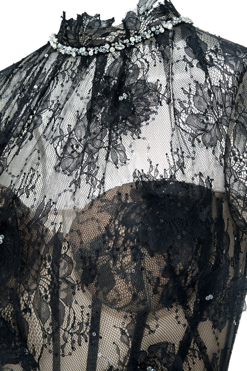 Elegant black YEDDA gown by JOSÉPHINE, featuring a flowing design with intricate details, perfect for formal occasions.