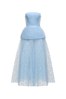 Elegant blue Kylie gown by Joséphine, featuring flowing fabric and intricate detailing, perfect for formal occasions.