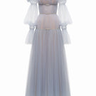 Blue Aurora gown by Joséphine, elegant long dress with flowing fabric and intricate design, perfect for formal occasions.