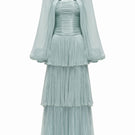 Blue ALZIRA gown by JOSÉPHINE, elegant dress with flowing fabric and detailed design, perfect for formal occasions.