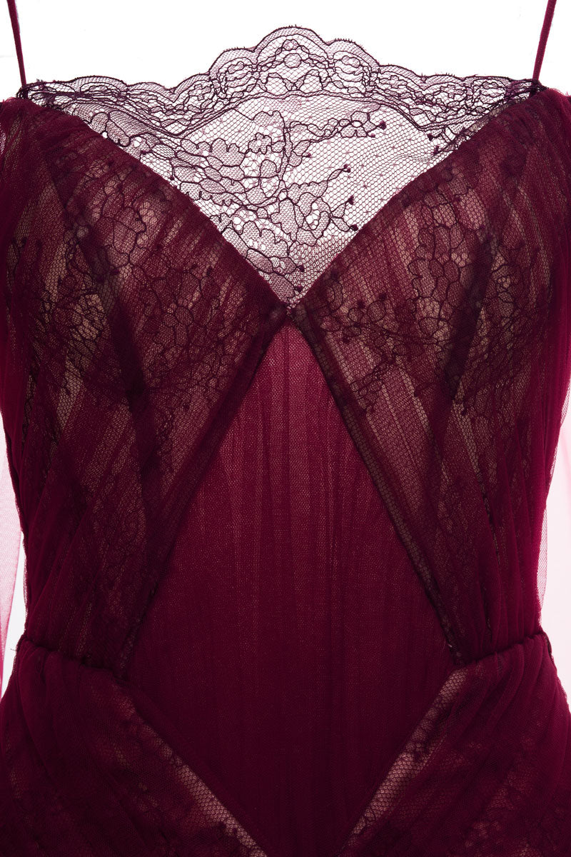 Elegant burgundy Rosalíe maxi dress by JOSÉPHINE, featuring flowing fabric and a stylish design, displayed on a hanger.