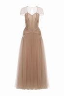 Elegant white tulle gown by Joséphine called Deliah Dress in Tulle, featuring flowing fabric and intricate detailing.