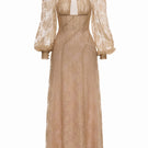 Beige JADLINE maxi dress by JOSÉPHINE featuring flowing fabric and elegant design, displayed on a hanger.