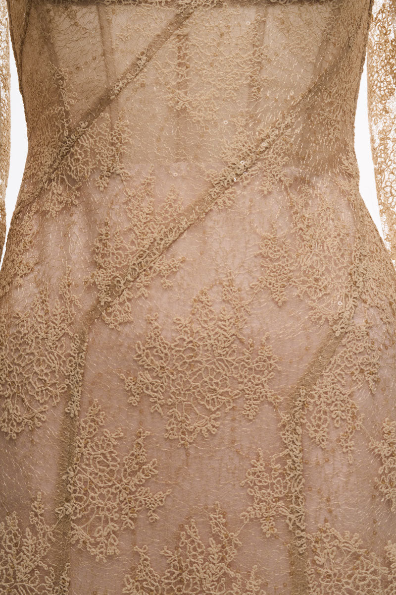 Beige JADALINE maxi dress by JOSÉPHINE, flowing fabric and elegant design, displayed on a hanger.