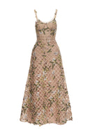 Beige Elsie gown by Joséphine, elegant long dress with flowing fabric, perfect for formal occasions.