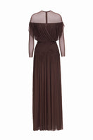Brown ASTRA maxi dress by JOSÉPHINE, flowing fabric with a fitted waist and elegant design, shown on a model.