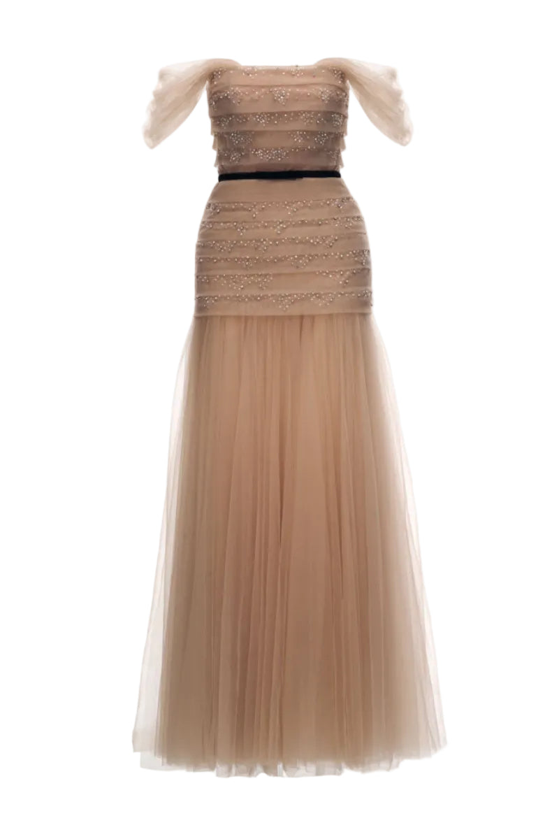 Beige ABIGAL gown by JOSÉPHINE showing elegant fabric and flowing design on a model.