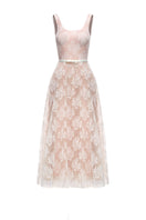 White YURI gown by JOSÉPHINE featuring elegant fabric and flowing design, perfect for formal occasions.