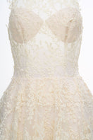Cream Cynthia gown by Joséphine featuring elegant fabric and tailored fit, displayed on a dress form.