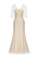 Elegant lace gown by Joséphine, featuring intricate lace details and a flowing silhouette, perfect for formal occasions.