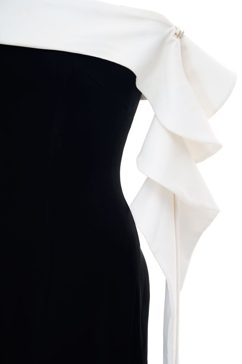 Black Magnolia maxi dress by Joséphine, flowing fabric with elegant design, shown on a model.