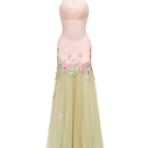 Elegant Josephine Lotus Dress gown in flowing fabric, featuring a floral pattern and a graceful silhouette.