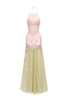Elegant Josephine Lotus Dress gown in flowing fabric, featuring a floral pattern and a graceful silhouette.
