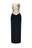 Black Samyra gown by JOSÉPHINE, elegant evening dress with flowing fabric and sophisticated design, shown on a model.