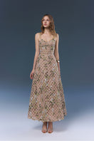 Beige Elsie gown by Joséphine featuring elegant fabric and flowing design, perfect for formal occasions.