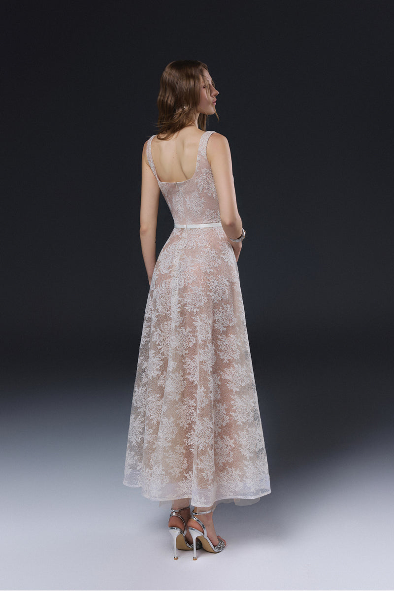 White YURI midi dress by JOSÉPHINE featuring a flowing silhouette and elegant design, perfect for stylish occasions.