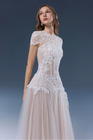 White Angelica gown by Joséphine, elegant floor-length dress with flowing fabric and delicate details, perfect for formal occasions.