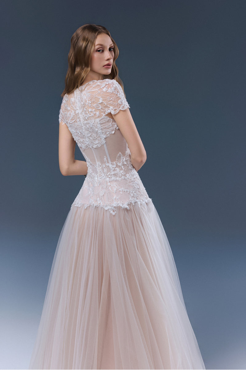 White Angelica Maxi Dress by JOSÉPHINE, flowing fabric, elegant design, showcased on a model.