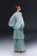 Blue Alzira gown by JOSÉPHINE, elegant evening dress with flowing fabric and detailed design, perfect for formal occasions.
